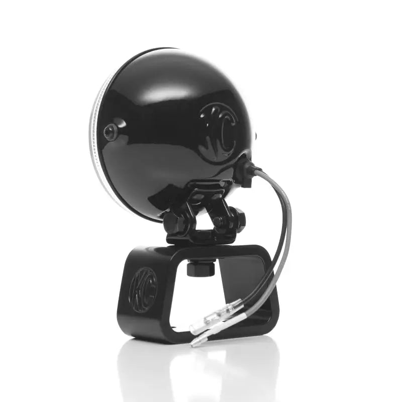 Black camera on white background, KC HiLiTES Rally 400s - Spread Beam (Pair Pack)