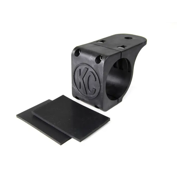 Black universal tube clamp with piece of black material for KC HiLiTES product.