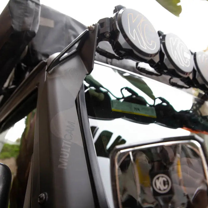 Universal wire hider with motorcycle mirror close up