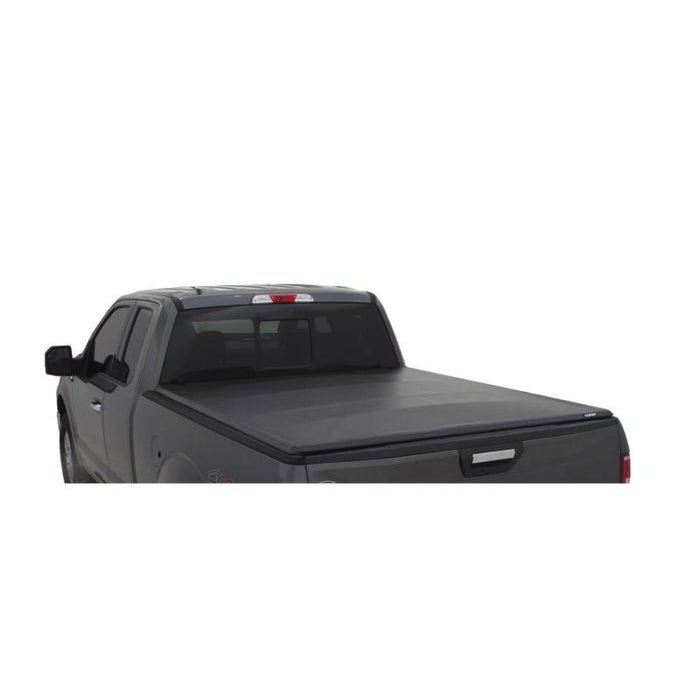 Black lund genesis tri-fold tonneau cover for 05-15 toyota tacoma with 5ft. Bed