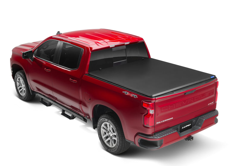 Red truck with black bed cover - lund 05-15 toyota tacoma fleetside hard fold tonneau cover