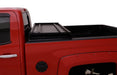 Red truck with black bed cover - lund 05-15 toyota tacoma fleetside (6ft. Bed) hard fold tonneau cover