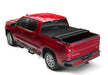 Lund black hard fold tonneau cover for 05-15 toyota tacoma with 6ft. Bed in red color