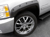 White truck with black rim and tire, featuring lund’s rx-rivet style fender flares for toyota tacoma
