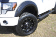 White truck with black wheels and tires, lund’s rx-rivet style fender flares for toyota tacoma