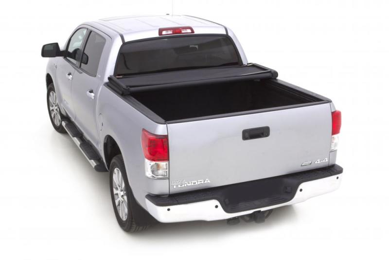 Lund genesis elite tri-fold tonneau cover on toyota tacoma with 5ft. Bed - black