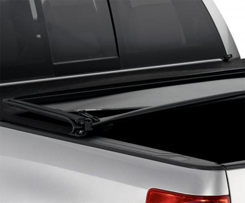 Toyota tacoma genesis elite tri-fold tonneau cover with black roof rack