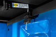 Black hard fold tonneau cover on blue bus. Lund 16-23 toyota tacoma (5ft. Bed)