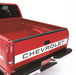 Red truck with black stripe on lund universal pickup tailgate protector - black