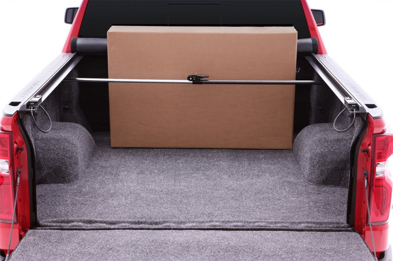 Lund universal ratcheting cargo bar - black for jeep wrangler and ford bronco – red truck with box in back