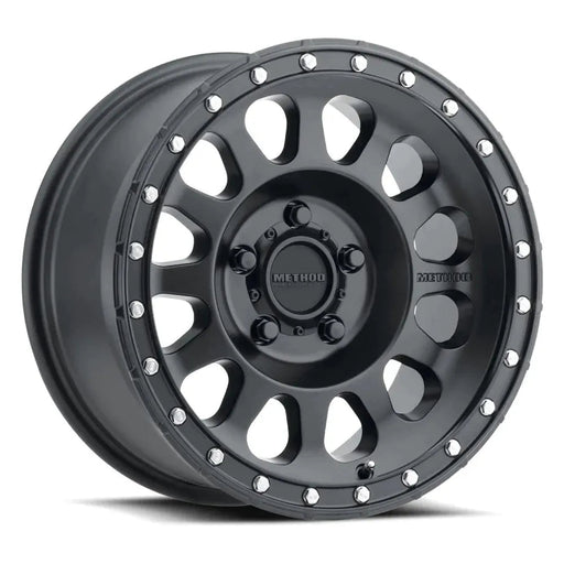 Method mr315 20x9 matte black wheel with center hole and rivets