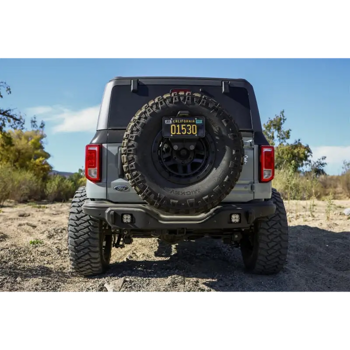 Mickey Thompson Baja Legend MTZ tire cover on rear of Jeep