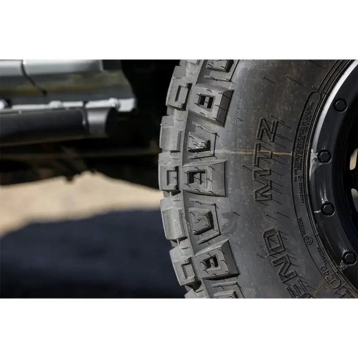 Mickey Thompson Baja Legend MTZ tire with cap on it.