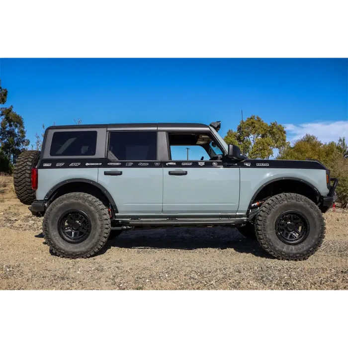 Truck parked in dirt field, Mickey Thompson Baja Legend MTZ Tire - LT305/55R20