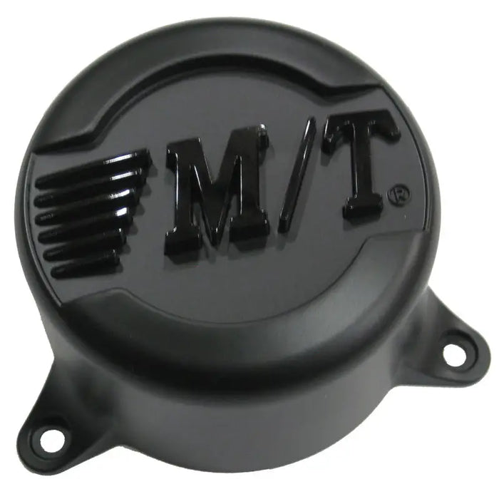 Black plastic cover with TM logo on Mickey Thompson Classic Baja Lock Center Cap.