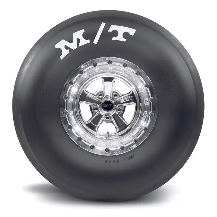 Mickey Thompson drag tire with car-like wheel design.