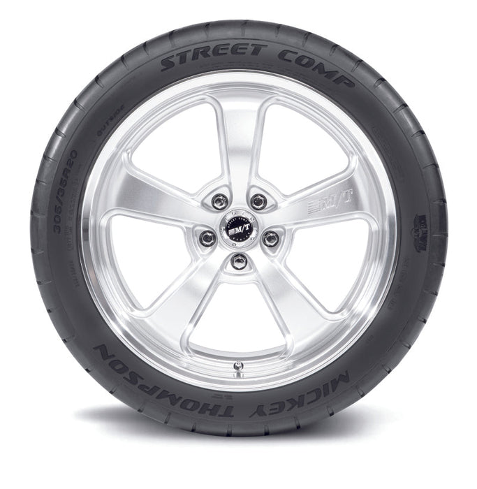 Mickey thompson street comp tire - 255/35r20 97w displayed on street