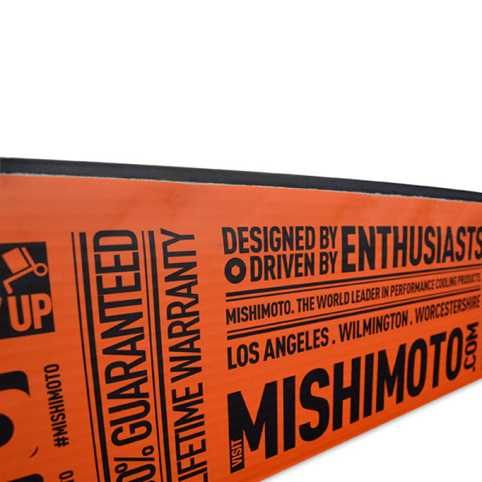 Mishimoto mitsubishi lancer evo iv-vi manual aluminum radiator with orange sign