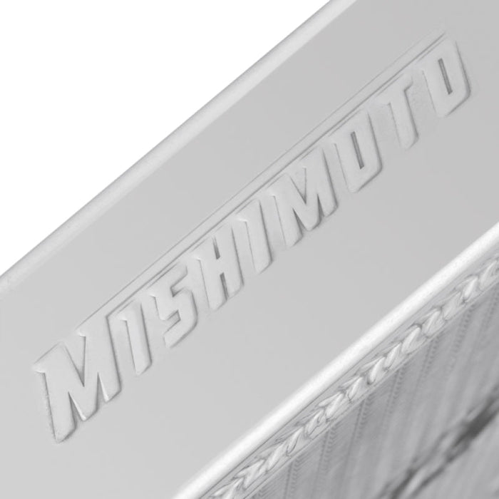 Mishimoto mitsubishi lancer evo iv-vi manual aluminum radiator - silver metal door viewed from the back