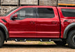 Red truck parked in front of a barn, n-fab epyx 2021 ford bronco 4 door - full length - tex. Black