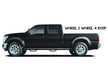 Black truck with n-fab nerf step for 16-17 toyota tacoma double cab featuring wheel 2 wheel design