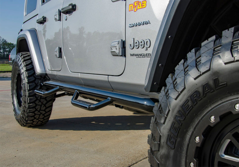 Gloss black n-fab nerf step for 2018 jeep wrangler jl suv 4 door, featuring white jeep with black tire cover