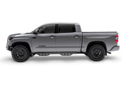 Front end of gray truck featuring n-fab podium lg 07-17 jeep wrangler jk 4 door all - tex. Black - 3in step