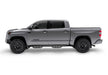 Front end view of gray toyota tacoma double cab truck with n-fab podium lg 16-17 in tex. Black - 3in pod