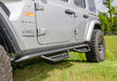 Front end view of gray jeep wrangler jt 4dr with n-fab podium lg step design in tex. Black stainless steel