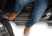 N-fab predator pro step system for 14-18 toyota 4 runner suv - image of a man in a wheelchair with legs up