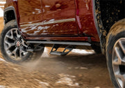 Red truck driving on dirt road - n-fab predator pro step system for toyota 4 runner suv