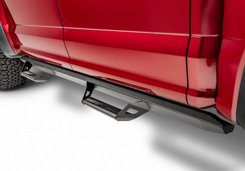 N-fab predator pro step system for toyota 4 runner suv featuring red truck with black step bars