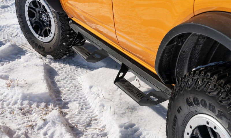 N-fab predator pro step system on truck tire in snow