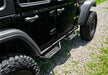 Jeep wrangler jl 4dr with tex. Black cab length nerf steps and black tire cover
