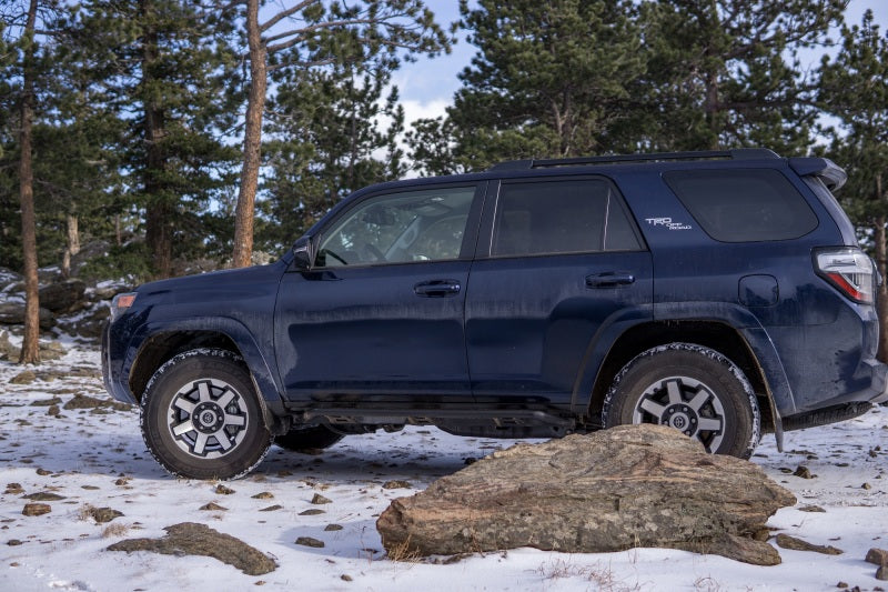 2019 toyota 4runner in snow with n-fab trail slider steps in textured black