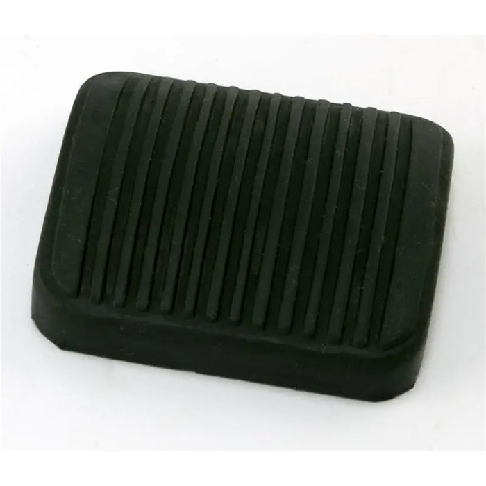 Black plastic foot rest for Omix brake/clutch pedal pad on white surface