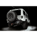 Close up of white Jeep parked in garage with flush mount LED tail lights - product name ’Oracle 07-17 Jeep Wrangler JK Flush Mount LED Tail Lights -