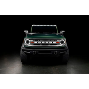 Green Jeep with Oracle 2021+ Ford Bronco Integrated Windshield Roof LED Light Bar System