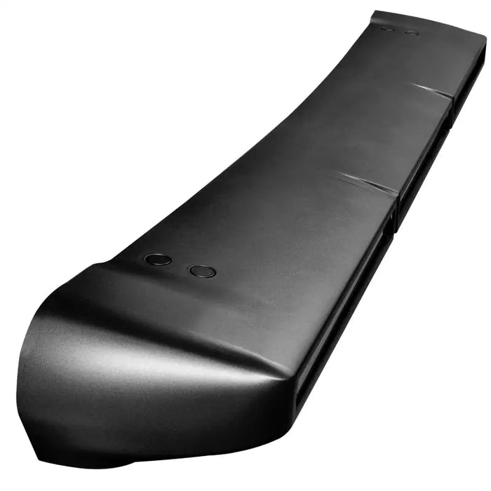 Black plastic bumper cover for rear bumper.