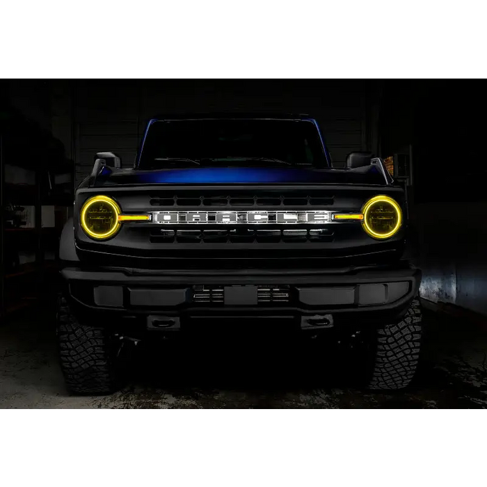 Black truck with yellow headlights and white bumper - Oracle Ford Bronco Headlight Halo Kit w/ DRL Bar
