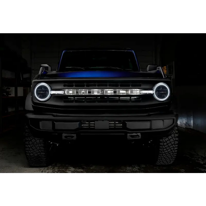 Black truck with blue light DRL bar - 21-22 Ford Bronco Headlight Halo Kit SEO.