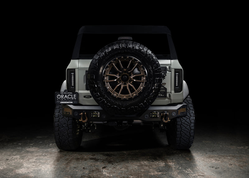 Jeep with tire on dark surface, oracle 21-23 ford bronco flush style led taillights - tinted