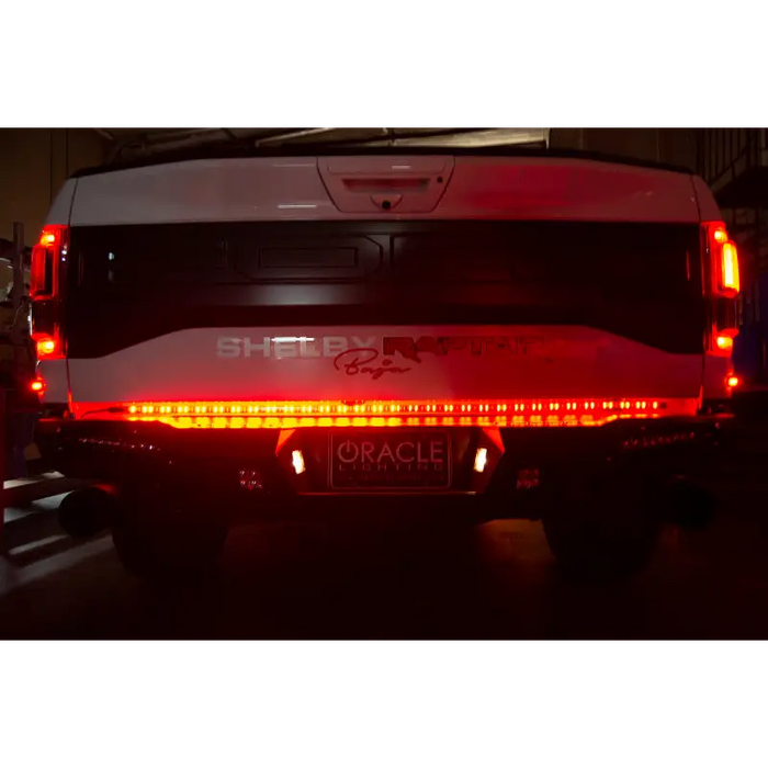 Oracle 60in Double Row LED Truck Tailgate Light Bar with white truck and red lights