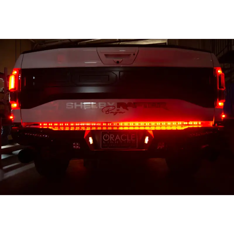 White van with red LED lights, Oracle 60in Double Row LED Truck Tailgate Light Bar