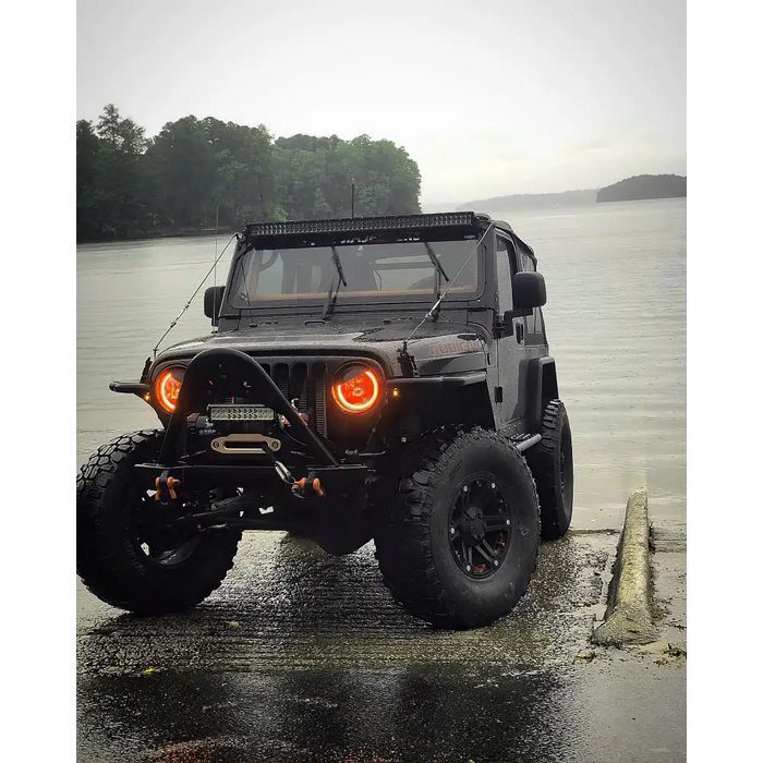 Black Jeep with Oracle 7in High Powered LED Headlights - Amber Bezels