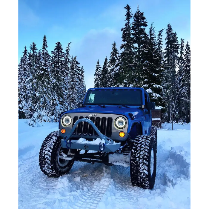 Custom Jeep Wrangler Oracle LED Headlights in snow.