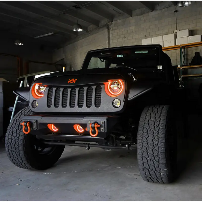 High powered LED headlight on Jeep with front lightbar.