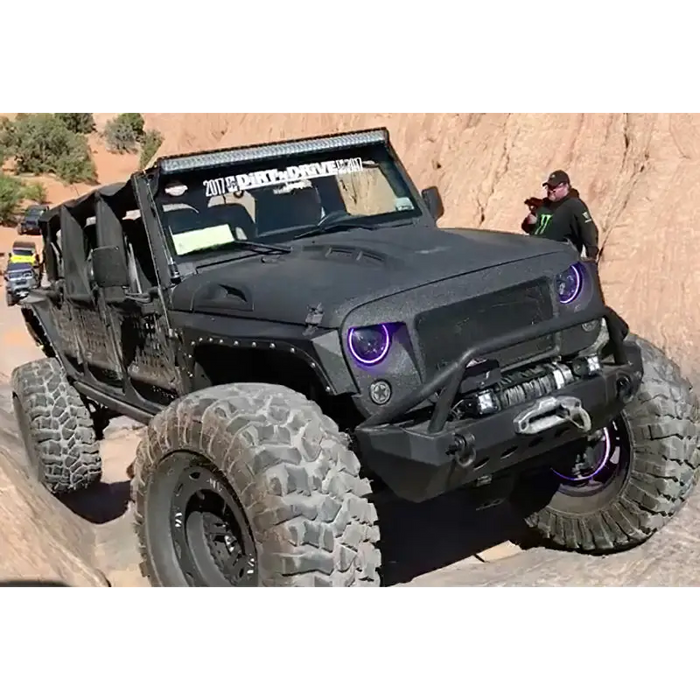 Black Jeep with Big Tire featuring Oracle 7in High Powered LED Headlights