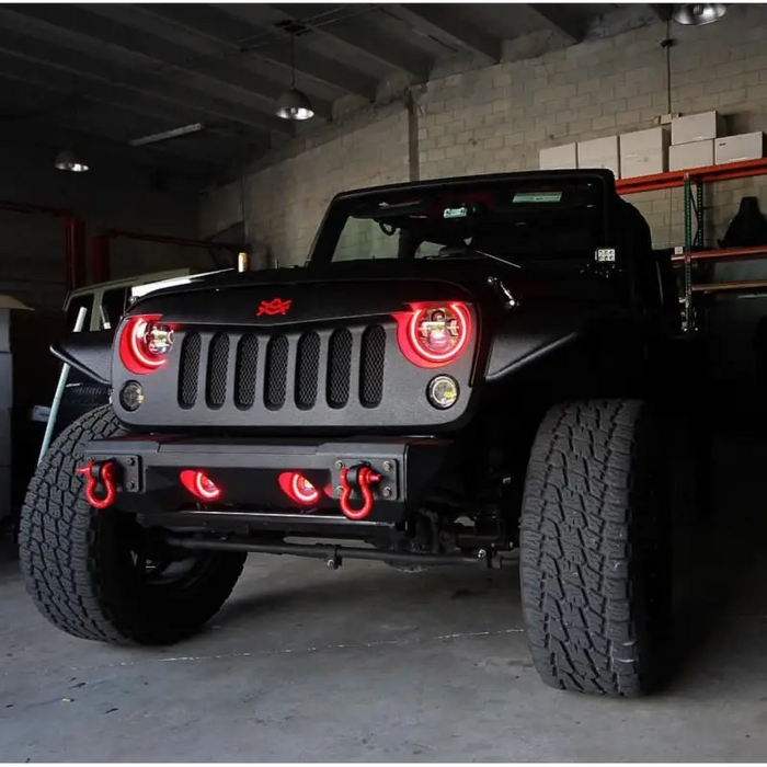 Close up of a Jeep with red LED light - Oracle 7in ColorSHIFT LED Headlights for Jeep Wrangler