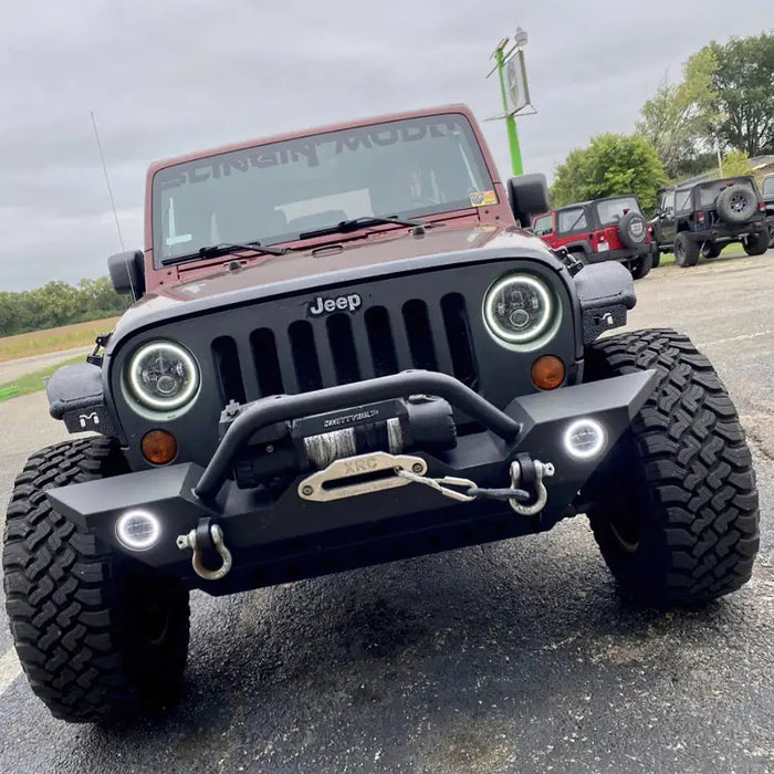 Black Dynamic Oracle 7in LED Headlights on Jeep with Front Bumper Light